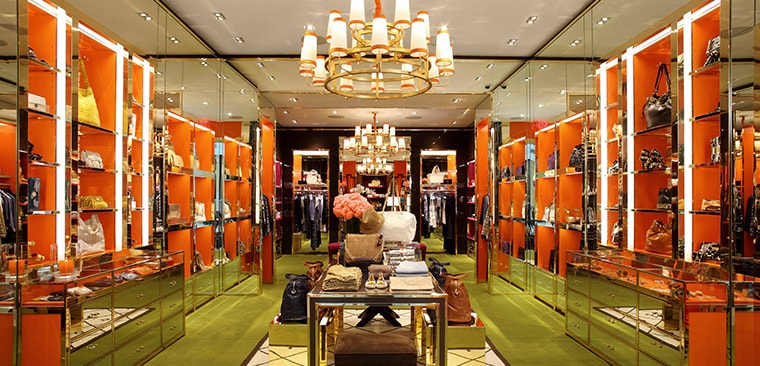 Navigation menu An eclectic mix of bohemian glamour and American sportswear, the Tory Burch brand is known for effortlessly stylish, always-interesting pieces ranging from apparel to shoes to accessories.
